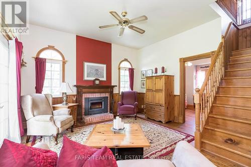 4 Thomas Street, Adjala-Tosorontio, ON - Indoor Photo Showing Living Room With Fireplace