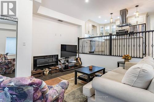 195 Tragina Avenue N, Hamilton, ON - Indoor Photo Showing Living Room With Fireplace