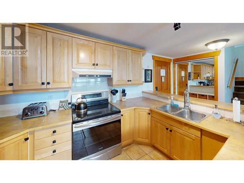 5350 Highline Drive Unit# 2315, Fernie, BC - Indoor Photo Showing Kitchen With Double Sink