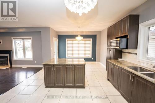 229 Kiwanis Court, Ottawa, ON - Indoor Photo Showing Kitchen With Fireplace With Double Sink