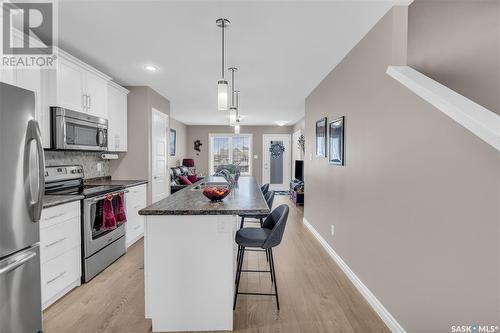 11 4801 Trinity Lane, Regina, SK - Indoor Photo Showing Kitchen With Stainless Steel Kitchen With Upgraded Kitchen