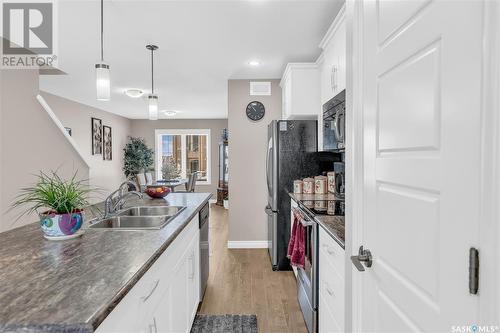 11 4801 Trinity Lane, Regina, SK - Indoor Photo Showing Kitchen With Double Sink