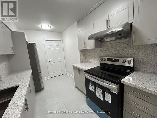 703 - 320 Dixon Road, Toronto, ON - Indoor Photo Showing Kitchen