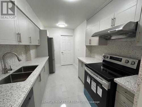 703 - 320 Dixon Road, Toronto, ON - Indoor Photo Showing Kitchen With Double Sink With Upgraded Kitchen