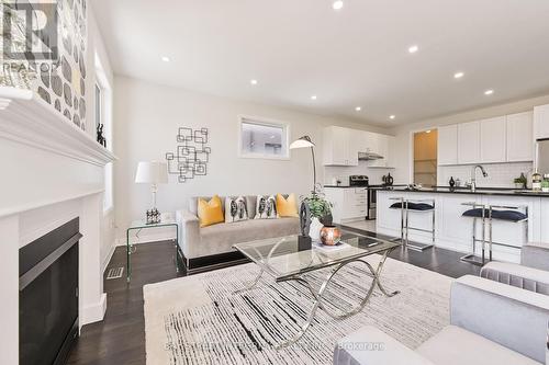 40 Stanley Greene Boulevard, Toronto, ON - Indoor Photo Showing Living Room With Fireplace