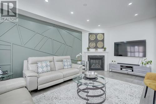 556 Bessborough Drive, Milton, ON - Indoor Photo Showing Living Room With Fireplace