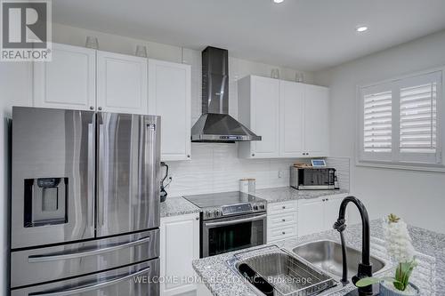 556 Bessborough Drive, Milton, ON - Indoor Photo Showing Kitchen With Stainless Steel Kitchen With Upgraded Kitchen