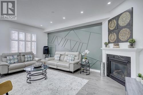 556 Bessborough Drive, Milton, ON - Indoor Photo Showing Living Room With Fireplace