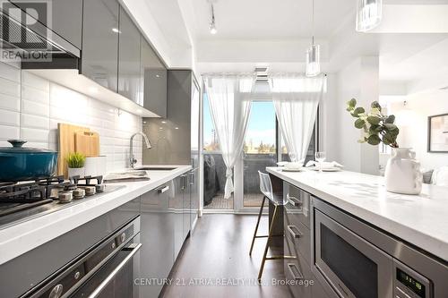 303 - 501 St Clair Avenue W, Toronto, ON - Indoor Photo Showing Kitchen With Upgraded Kitchen