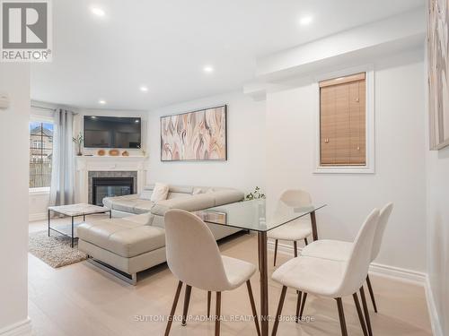 27 Bloomgate Crescent, Richmond Hill, ON - Indoor Photo Showing Dining Room With Fireplace