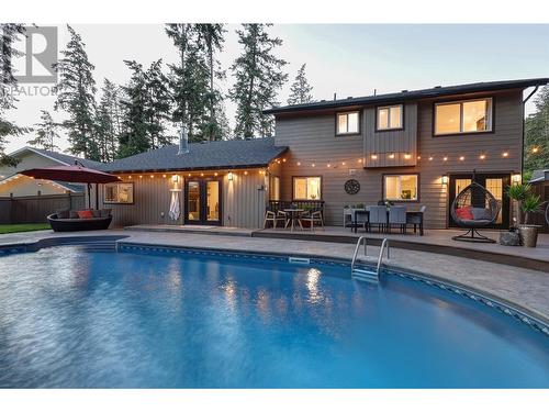 827 Coronado Court, Kelowna, BC - Outdoor With In Ground Pool With Deck Patio Veranda With Backyard