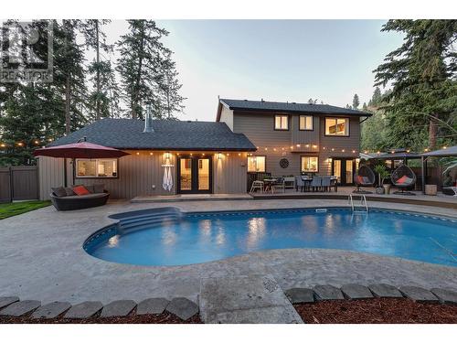 827 Coronado Court, Kelowna, BC - Outdoor With In Ground Pool With Deck Patio Veranda With Backyard