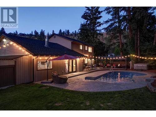 827 Coronado Court, Kelowna, BC - Outdoor With In Ground Pool With Deck Patio Veranda