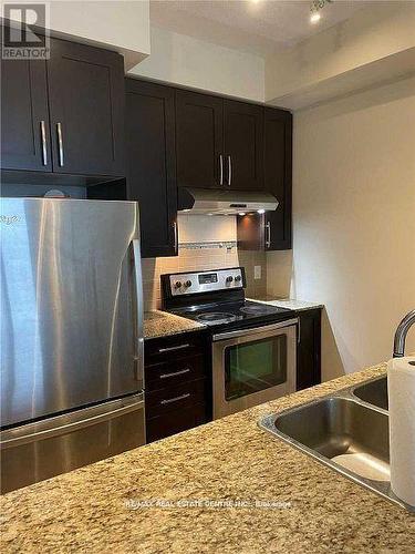 1205 - 4065 Brickstone Mews, Mississauga, ON - Indoor Photo Showing Kitchen With Stainless Steel Kitchen With Double Sink