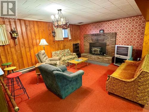 2245 Bealby Road, Nelson, BC - Indoor Photo Showing Living Room With Fireplace