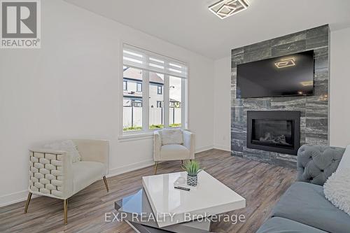 603 Noriker Court, Ottawa, ON - Indoor Photo Showing Living Room With Fireplace