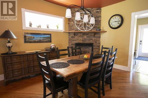 58 Wemyss St, Sault Ste. Marie, ON - Indoor Photo Showing Dining Room With Fireplace