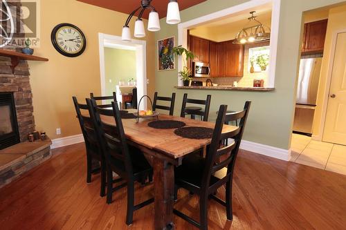 58 Wemyss St, Sault Ste. Marie, ON - Indoor Photo Showing Dining Room With Fireplace