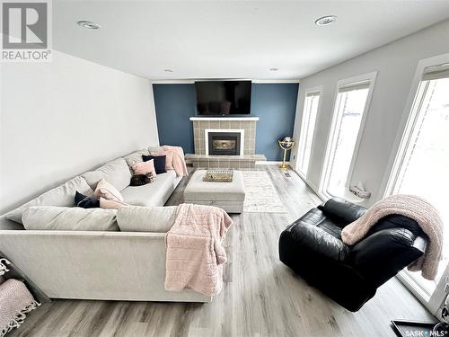 602 Brimacombe Drive, Weyburn, SK - Indoor Photo Showing Living Room With Fireplace