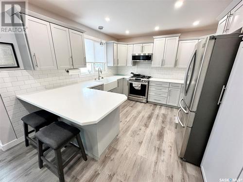 602 Brimacombe Drive, Weyburn, SK - Indoor Photo Showing Kitchen With Upgraded Kitchen