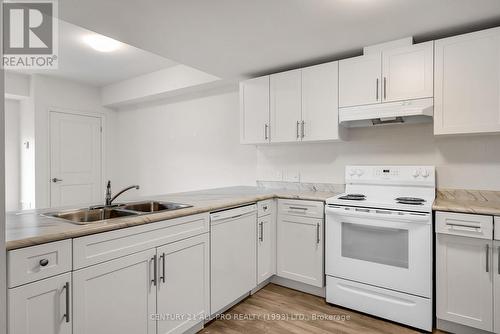 305 - 82 Munroe Street, Cobourg, ON - Indoor Photo Showing Kitchen With Double Sink