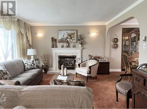 100 Meldrum Street, Kitimat, BC - Indoor Photo Showing Living Room With Fireplace