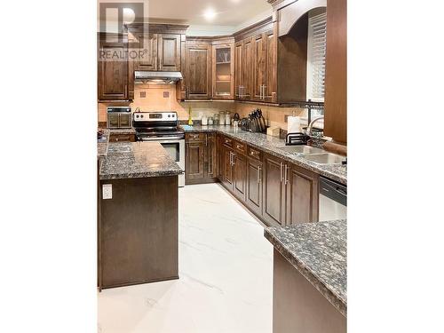 1890B Sage Street, Merritt, BC - Indoor Photo Showing Kitchen With Double Sink