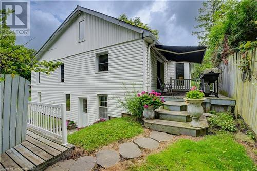 deck with awning leads to the eat-in kitchen - 1164 Brantford Highway, Cambridge, ON - Outdoor With Deck Patio Veranda With Exterior