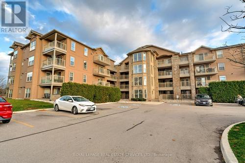 306 - 1460 Bishops Gate, Oakville, ON - Outdoor With Facade