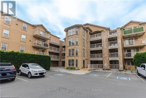 306 - 1460 Bishops Gate, Oakville, ON - Outdoor With Facade