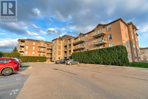 306 - 1460 Bishops Gate, Oakville, ON - Outdoor With Facade