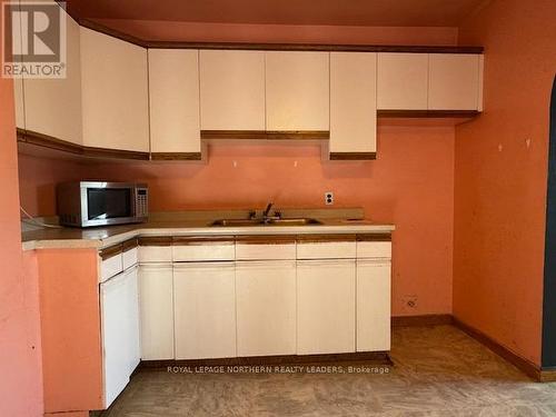 300 Elm Street S, Timmins, ON - Indoor Photo Showing Kitchen With Double Sink