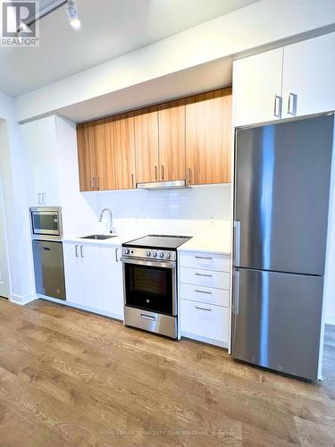 A-2210 - 30 Upper Mall Way, Vaughan, ON - Indoor Photo Showing Kitchen With Stainless Steel Kitchen