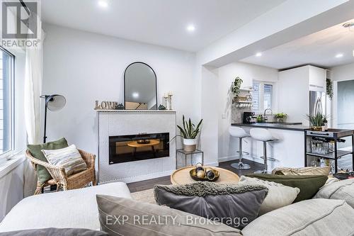 212 Sixth Street, Toronto, ON - Indoor Photo Showing Living Room With Fireplace