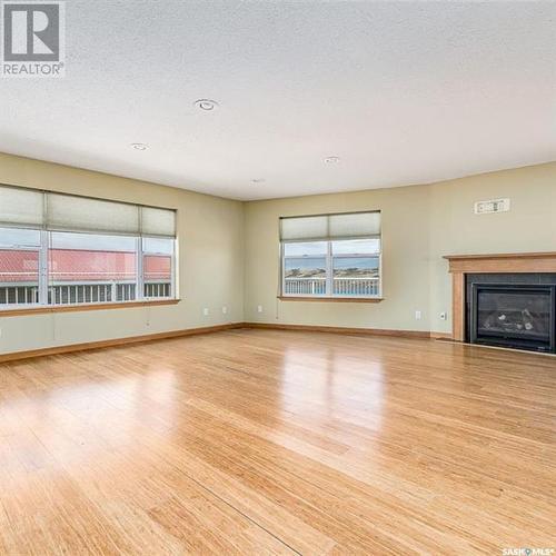 544 Richard Drive, South Lake, SK - Indoor Photo Showing Living Room With Fireplace