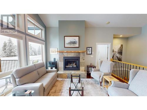 222 Boulder Creek, Cranbrook, BC - Indoor Photo Showing Living Room With Fireplace