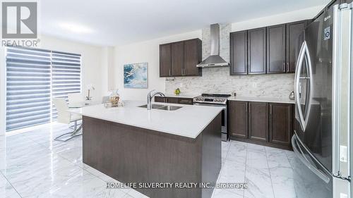 15 Neil Promenade, Caledon, ON - Indoor Photo Showing Kitchen With Double Sink With Upgraded Kitchen