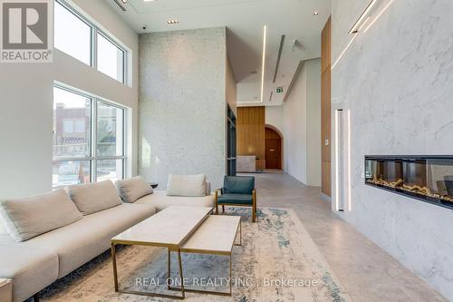 812 - 509 Dundas Street W, Oakville, ON - Indoor Photo Showing Living Room With Fireplace