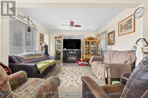 2800 Highway 15, Rideau Lakes, ON - Indoor Photo Showing Living Room With Fireplace