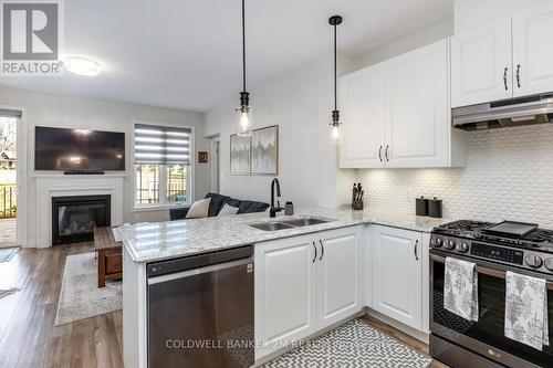 9 Corbett Street, Port Hope, ON - Indoor Photo Showing Kitchen With Fireplace With Stainless Steel Kitchen With Double Sink With Upgraded Kitchen