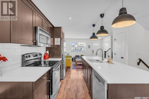 322 Levalley Cove, Saskatoon, SK - Indoor Photo Showing Kitchen With Double Sink With Upgraded Kitchen