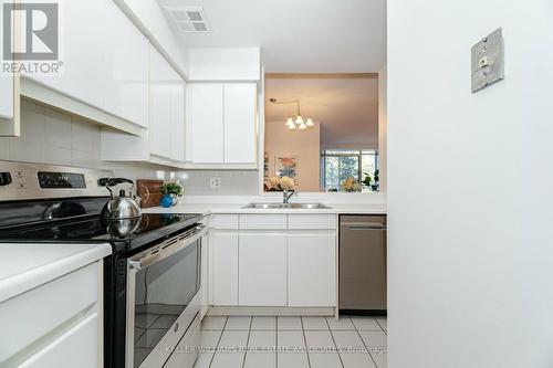 107 - 10 Torresdale Avenue, Toronto, ON - Indoor Photo Showing Kitchen With Stainless Steel Kitchen