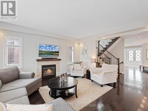 13 Coach Crescent, Whitby, ON - Indoor Photo Showing Living Room With Fireplace