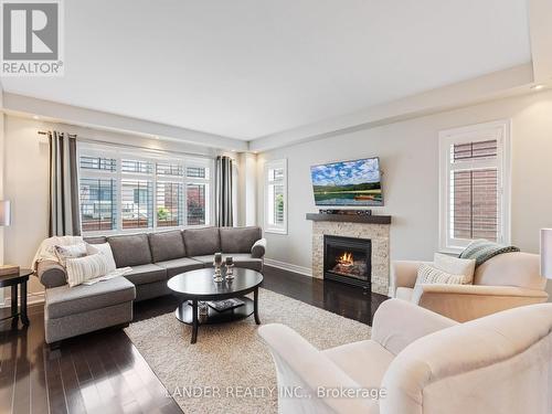 13 Coach Crescent, Whitby, ON - Indoor Photo Showing Living Room With Fireplace