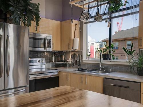 303-829 Goldstream Ave, Langford, BC - Indoor Photo Showing Kitchen With Stainless Steel Kitchen With Double Sink