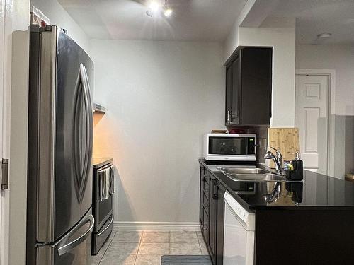 1106-83 Borough Dr, Toronto, ON - Indoor Photo Showing Kitchen With Double Sink