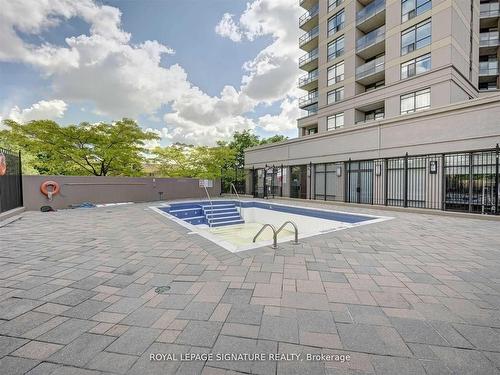 311-220 Forum Dr, Mississauga, ON - Outdoor With In Ground Pool