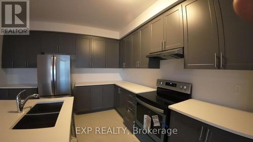 889 Knights Lane, Woodstock, ON - Indoor Photo Showing Kitchen With Double Sink