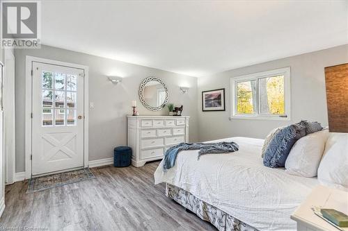 Primary bedroom with walk-out to deck - 756 King Road, Burlington, ON - Indoor Photo Showing Bedroom