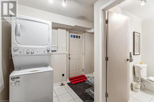 In-law suite with separate laundry and separate entrance through garage - 756 King Road, Burlington, ON - Indoor Photo Showing Laundry Room